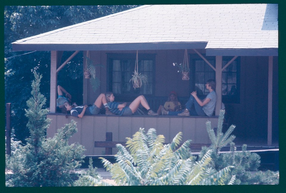 Staff 1976 relaxing on porch